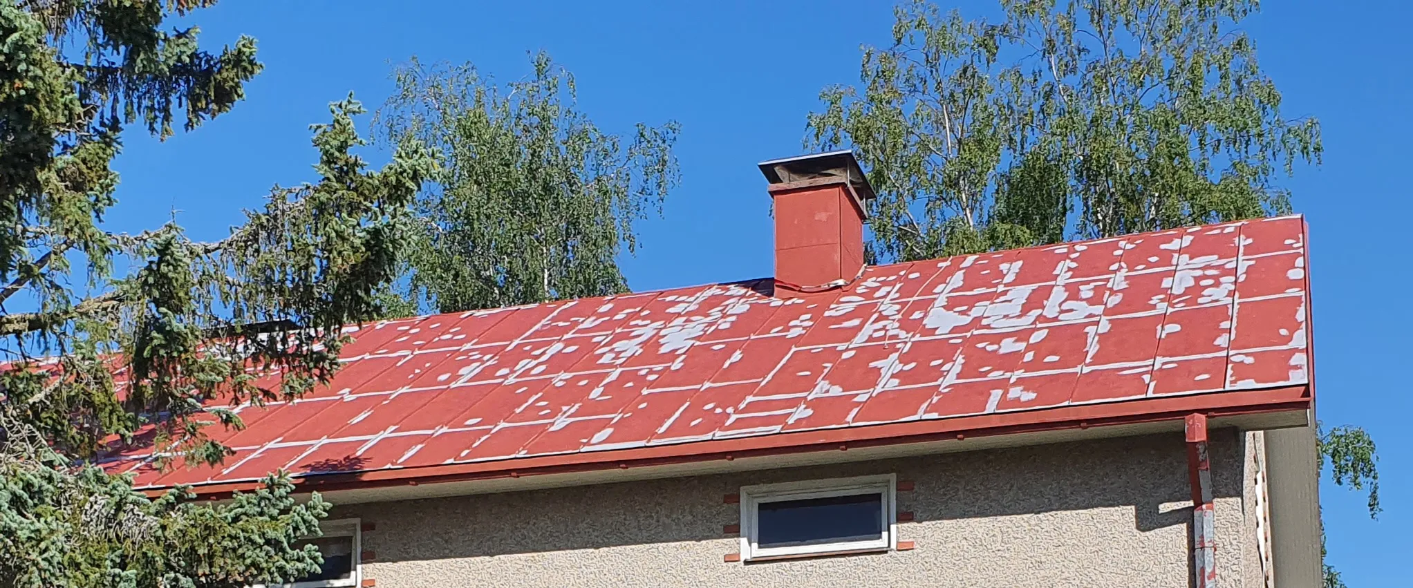 Konesaumakatto pinnoitus